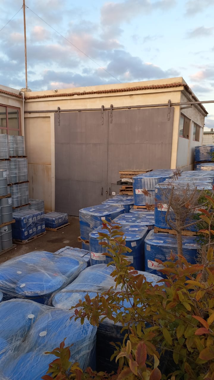 Blue barrel chemical storage yard at Magico Freezone